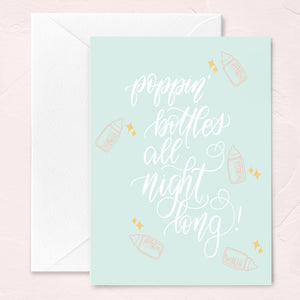mint green gender neutral baby greeting card with baby bottle illustrations and calligraphy