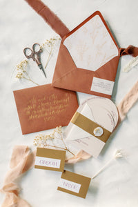 terracotta wedding invitations with envelope liner, arched cards and dried floral wax seals 