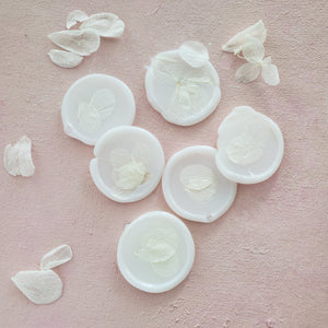 boho wedding diy wax seals with white hydrangea petals