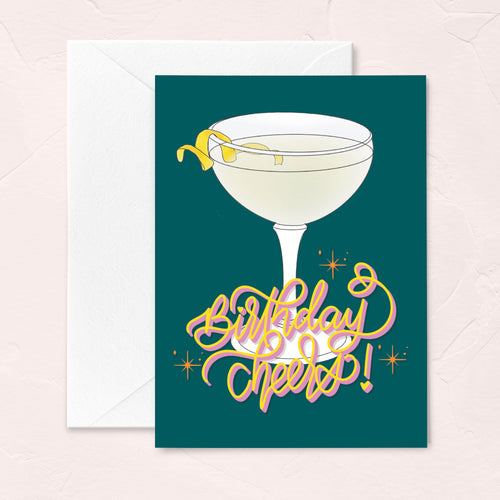 retro birthday card with a lemon drop martini cocktail illustration and the phrase birthday cheers in calligraphy