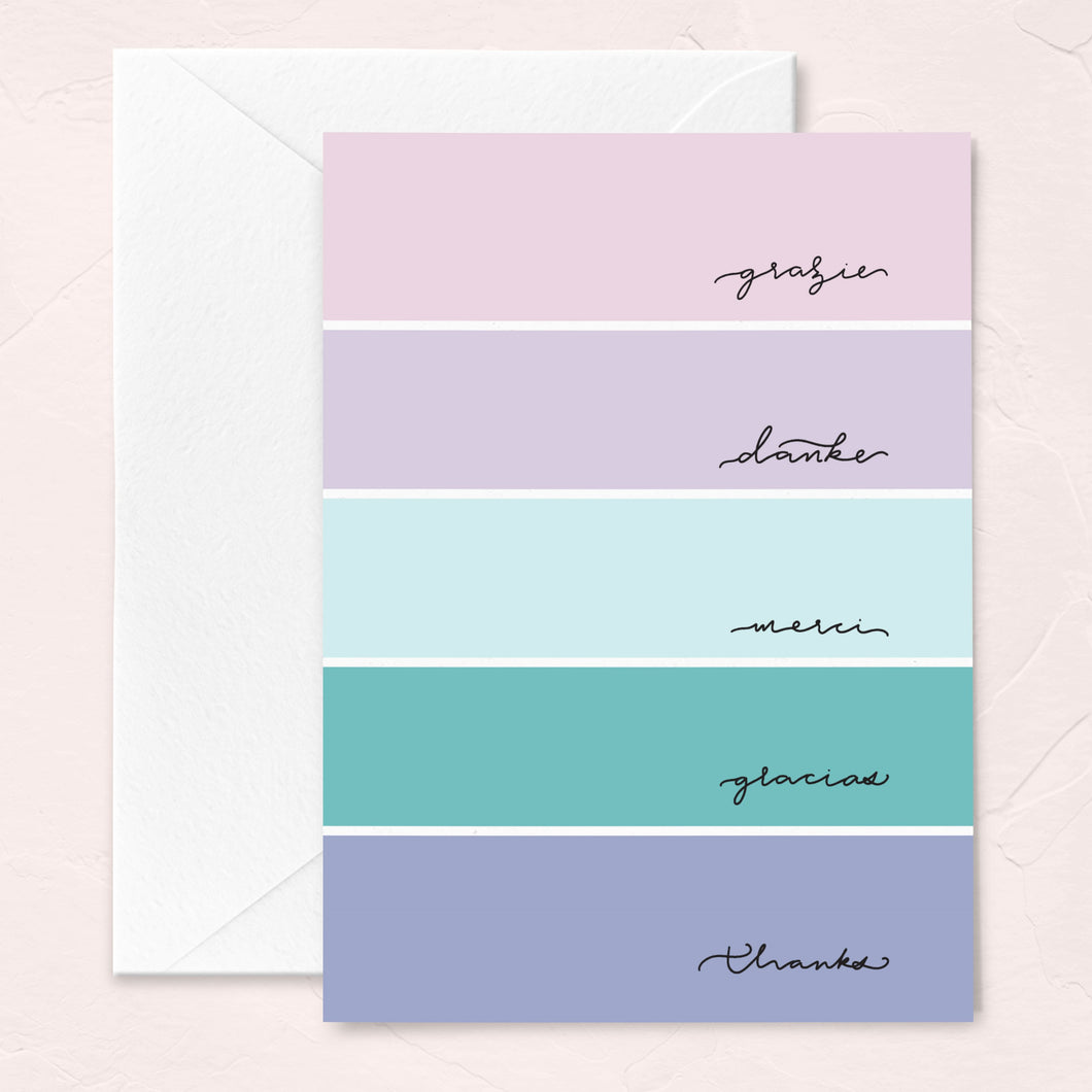 pastel color block thank you greeting card with the word thanks in many languages like italian, spanish, german and french