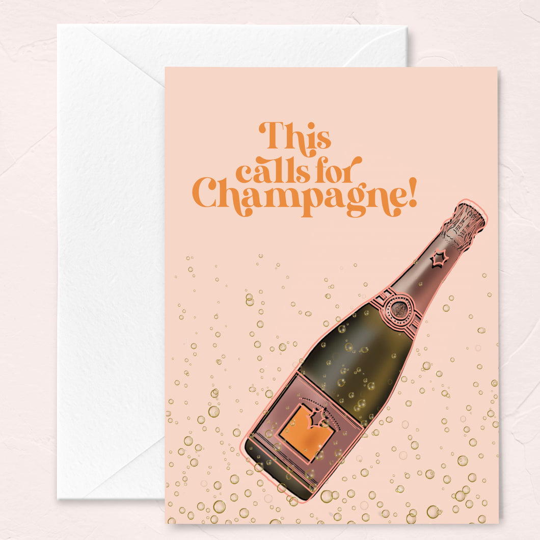 peach colored greeting card with a champagne bottle illustration, champagne bubbles and the words 'this calls for champagne'