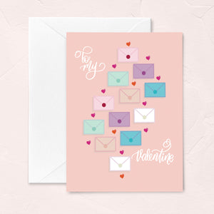 peach fuzz valentines day greeting card with love letter envelope illustrations and the phrase "to my valentine"