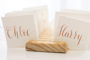hand torn paper calligraphy place cards by fioribelle