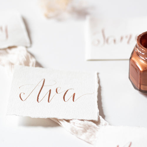 fine art calligraphy wedding place cards by fioribelle