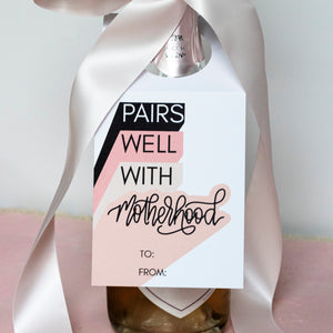 gifts for mom pairs well with motherhood wine bottle gift tag by fioribelle
