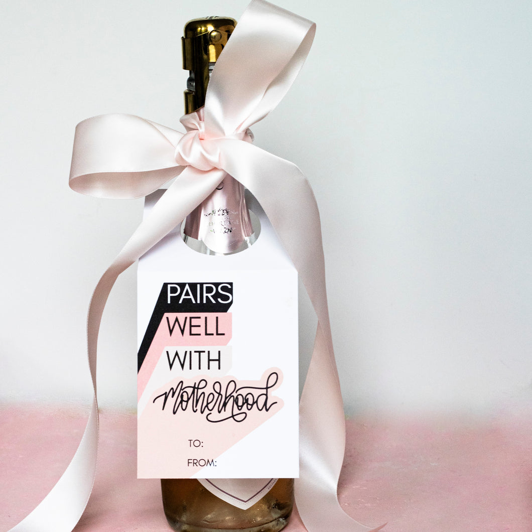 new mom gift pairs well with motherhood wine bottle gift tag by fioribelle