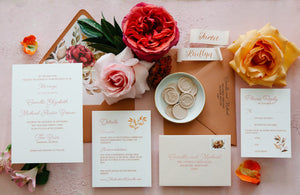 classic vintage floral wedding invitation with script font and nude wax seals